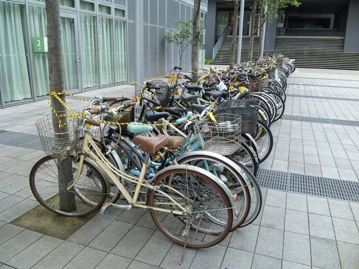 捨てられゆく哀れな自転車の山 Heritager Com